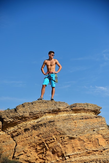 Extreme Climber On The Top Of Mountain