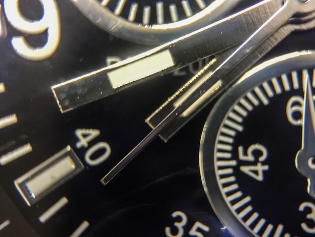 Photo extreme close up of wristwatch