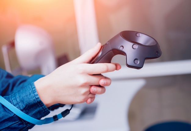 Eye treatment. Patient in virtual reality goggles. Checking the girl's vision with the help of virtual reality.