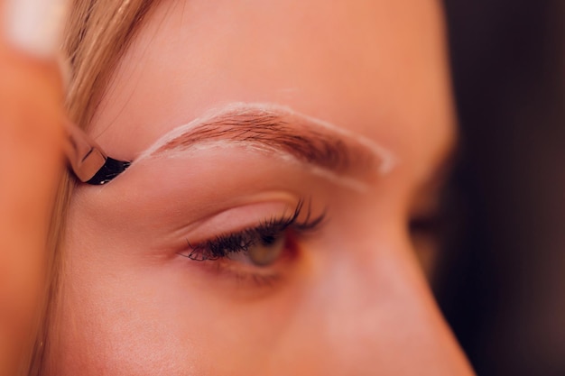 Eyebrows tinting treatment with natural henna dye