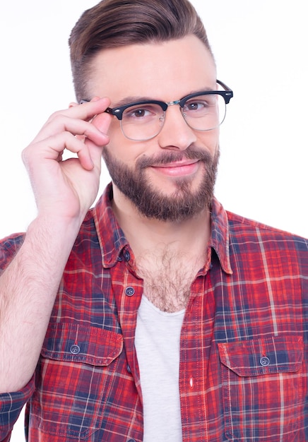 Eyecare Eye health Young handsome elegant bearded man in glasses Optics style for men Modern guy in spectacles Male beauty fashion Copy space