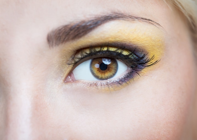 Eyed girl with bright makeup