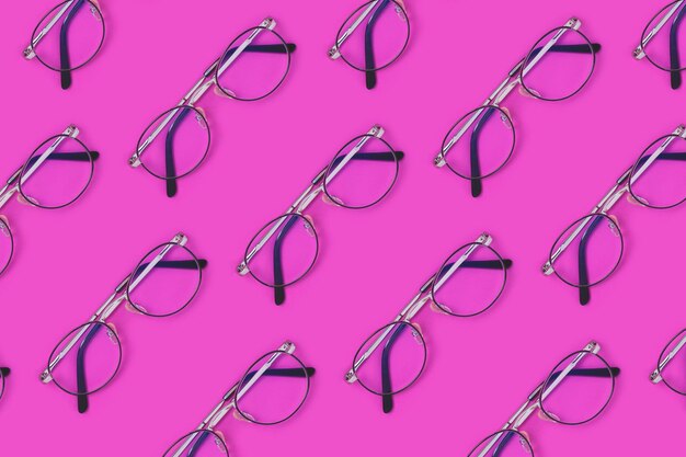 Eyeglasses pattern on a purple background