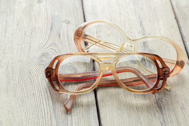 Eyeglasses on wooden table