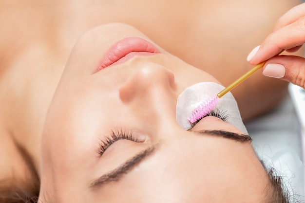 Eyelash extension with brush close up