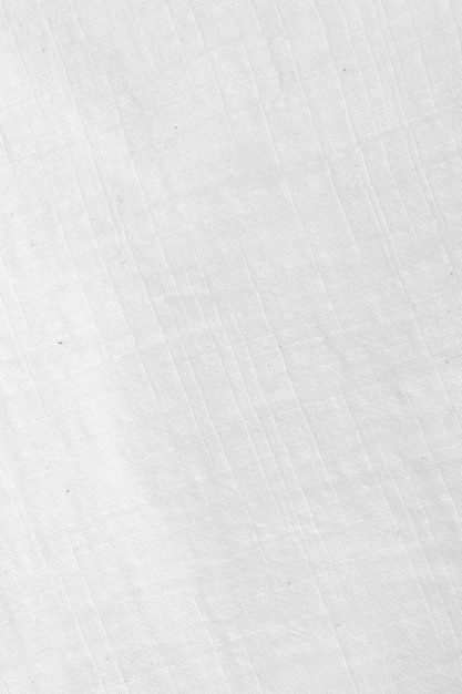 Fabric backdrop White linen canvas crumpled natural cotton fabric Natural linen top view background Organic Eco textiles White Fabric texture