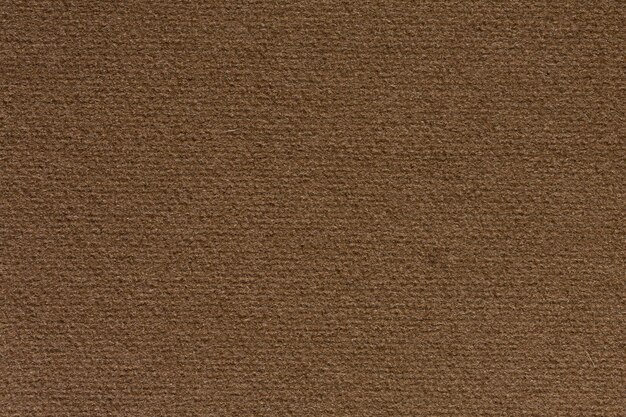 Fabric background in adorable chocolate colour closeup high resolution photo