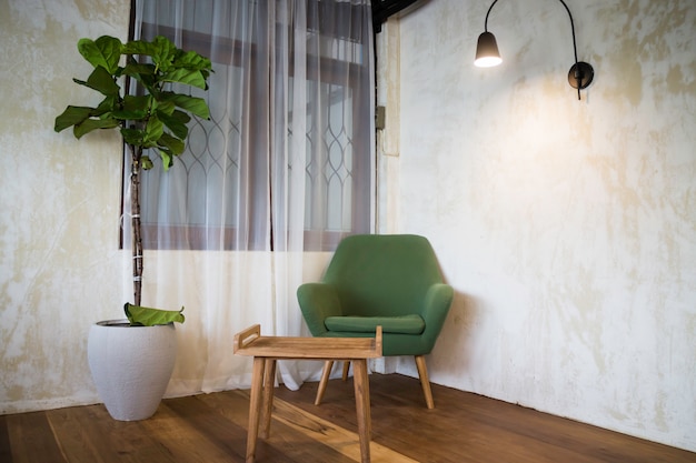 Fabric green chair in living room