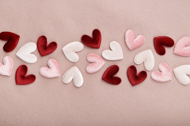 Fabric hearts on craft paper