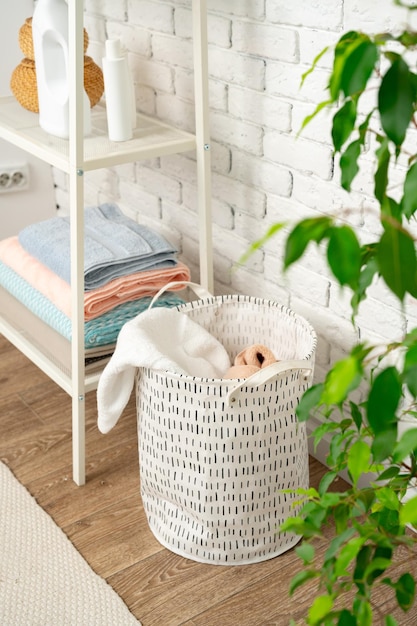 Fabric laundry basket in a bathroom close up