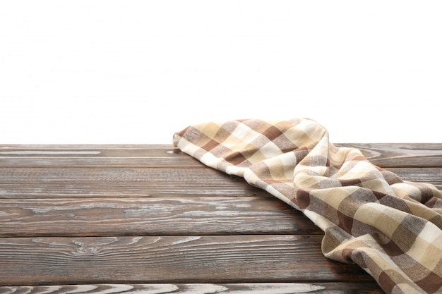 Fabric napkin on table against white background, space for text