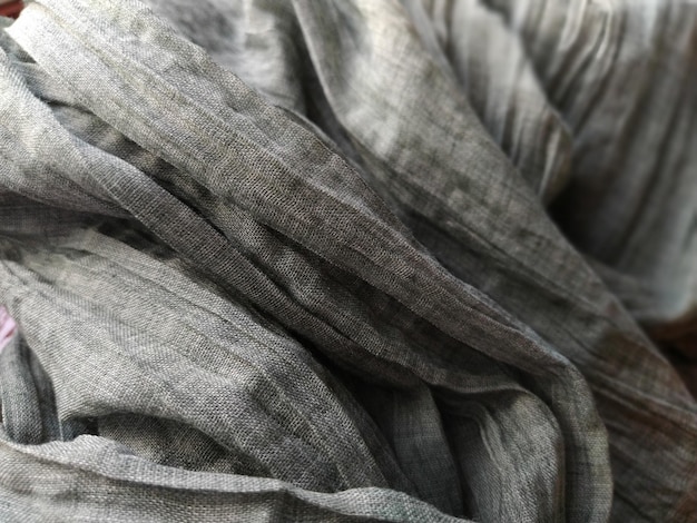 Fabric sheer curtain fabric Beautiful gray color The curtain material is carelessly folded and wrinkled Fabric sample Interior design option