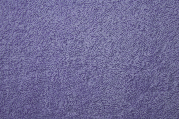 Fabric texture background of violet towel for a surface