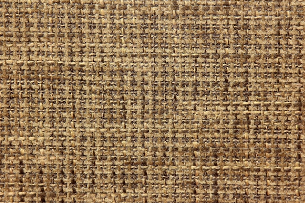 Fabric texture of burlap in neutral colors close up