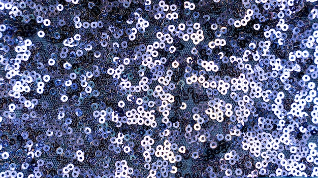 Fabric texture with spangles Background sequin Glitter texture Fabric sequins Blue sequins pattern Abstract background