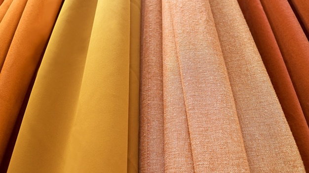 Fabrics in luxurious gold and brown color gradient