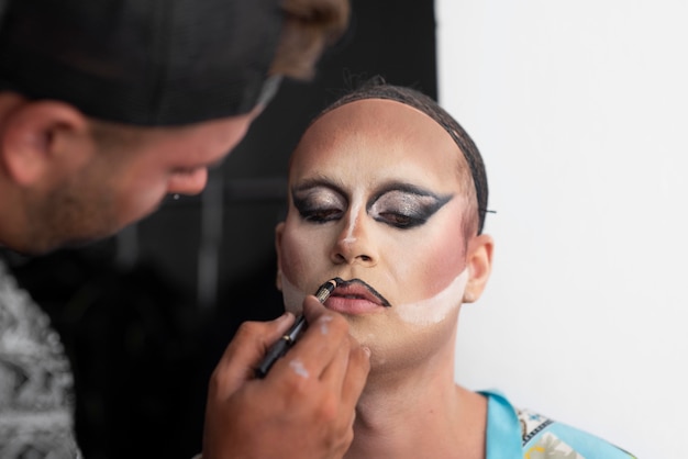 fabulous drag queen getting her makeup ready