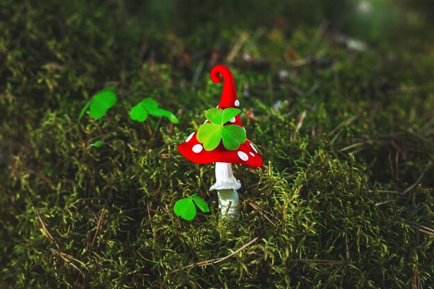 Fabulous plasticine fly agaric in the forest