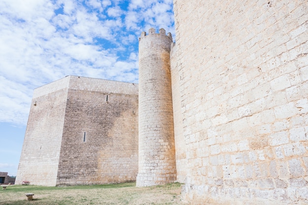 Facade of a 13th century castle in Montealegre de Campos. Side with a tower of the fortification.