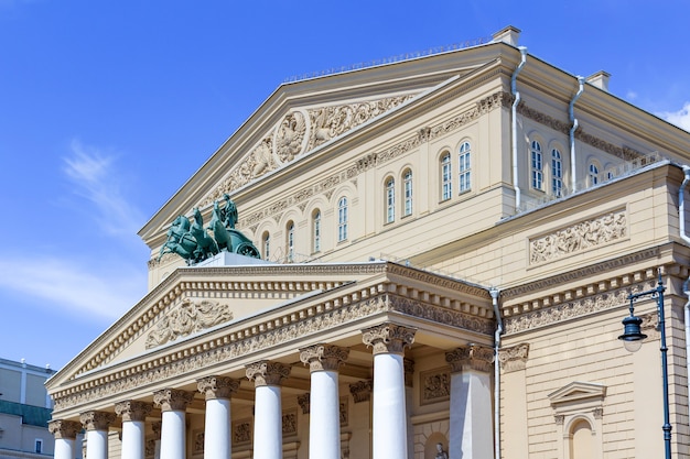 Facade of Bolshoi Theatre in Moscow close-up on a blue sky background in sunny summer morning