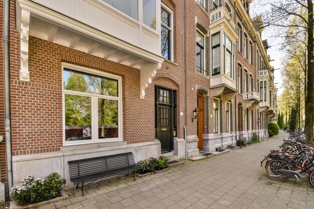 The facade of a brick building with wooden door