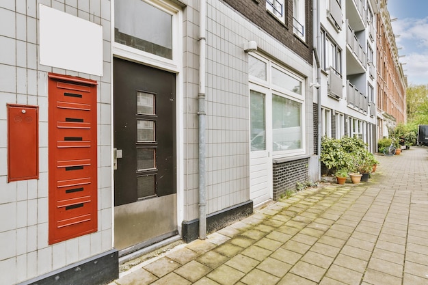 The facade of a brick building with wooden door