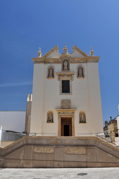 Photo the facade of a church in specchia a medieval village in the puglia region of italy