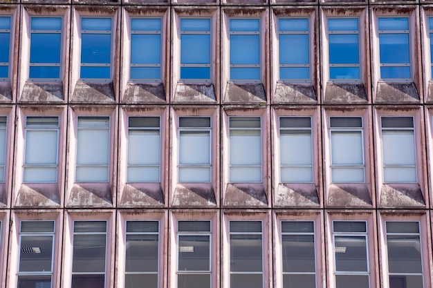 Facade detail with elongated windows and geometric shapes