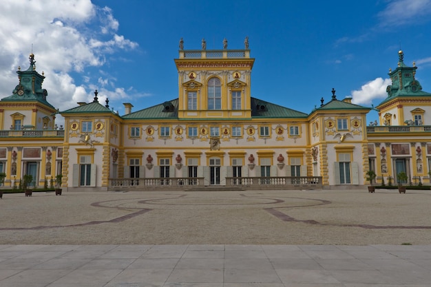 Facade of historic building against sky in city