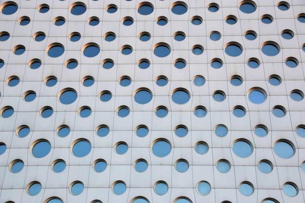 Facade of a modern building with round windows