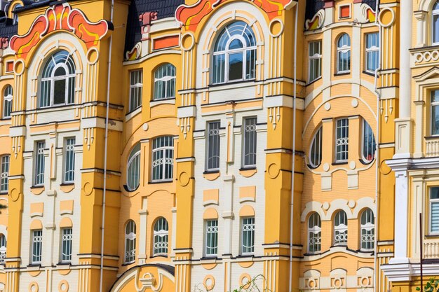 Facade of the modern multistory building in classical style closeup