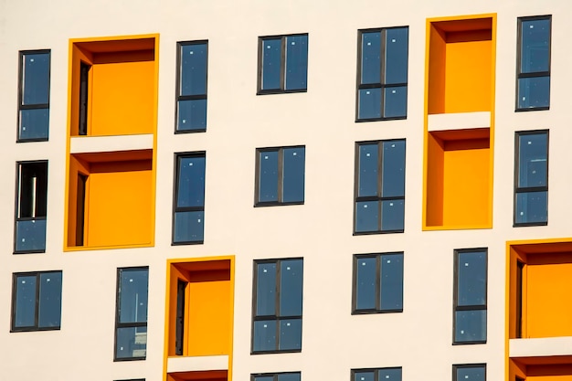 Facade of a new multi-story residential building. architecture and modern construction