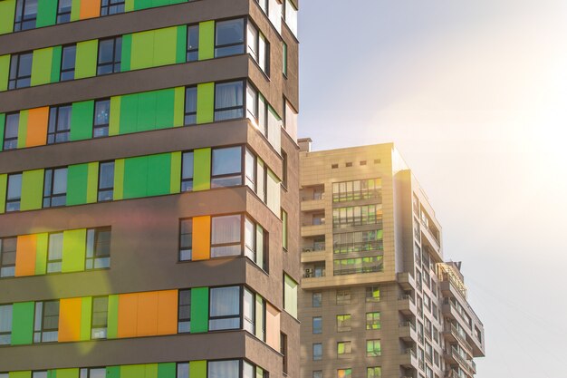 Facade of the new residential high-rise buildings against the sky