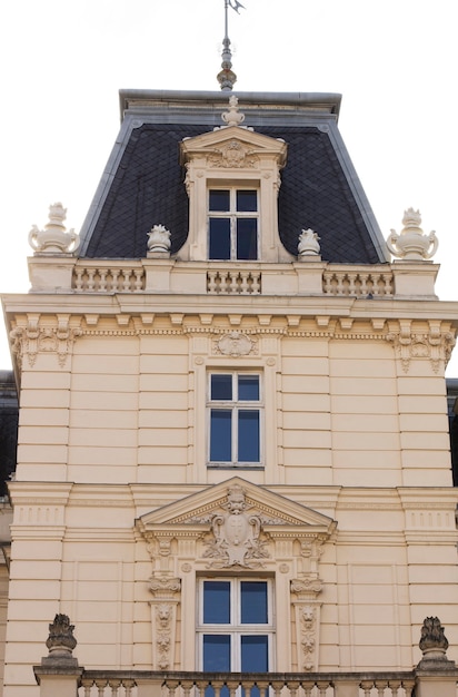 Facade of old building with shingles roof  in Lviv, Ukraine
