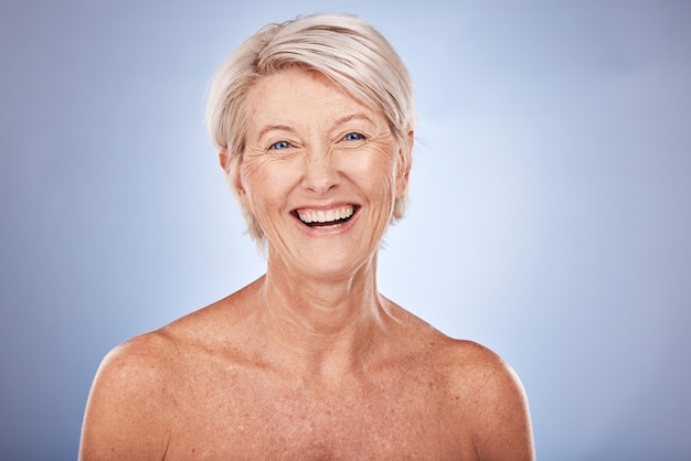 Face beauty and antiaging with a senior woman in studio on a gray background for skincare or wellness Portrait cosmetics and luxury with a mature female posing to promote a natural skin product