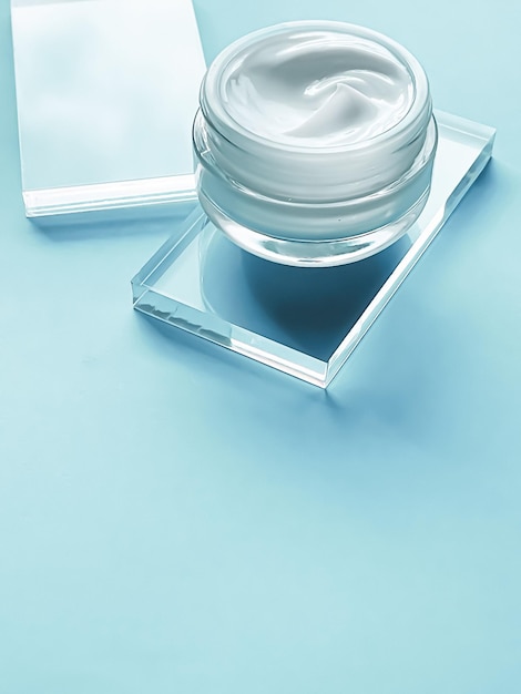 Face cream moisturiser jar on glass and mint background beauty product and skincare cosmetic science