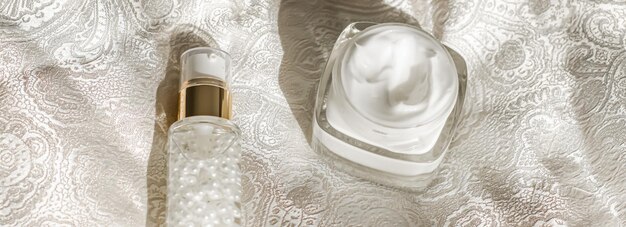 Face cream moisturizer in a jar and serum gel bottle luxury skincare product