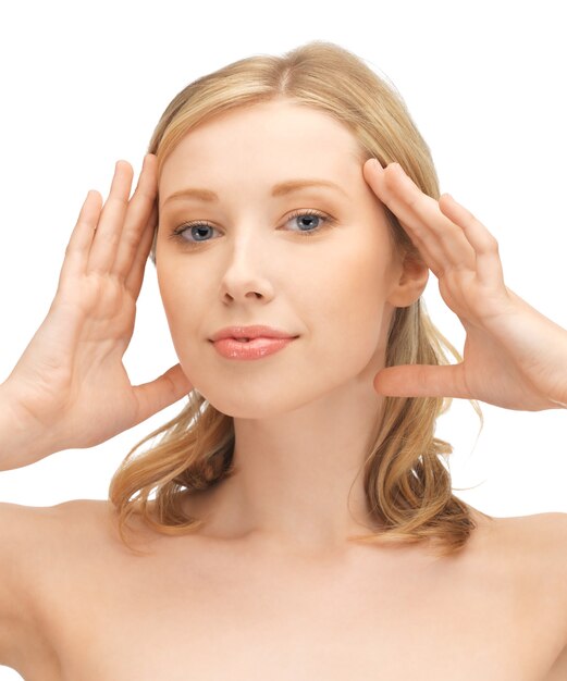 face and hands of beautiful woman with long hair