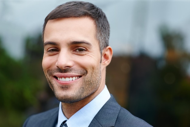 face man and happy on portrait as lawyer for career or job growth and opportunity with startup business male employee smile and satisfied for law firm progress as attorney or legal advisor