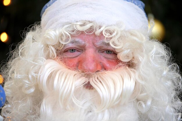 The face of the Russian Santa Claus in a hat with a beard