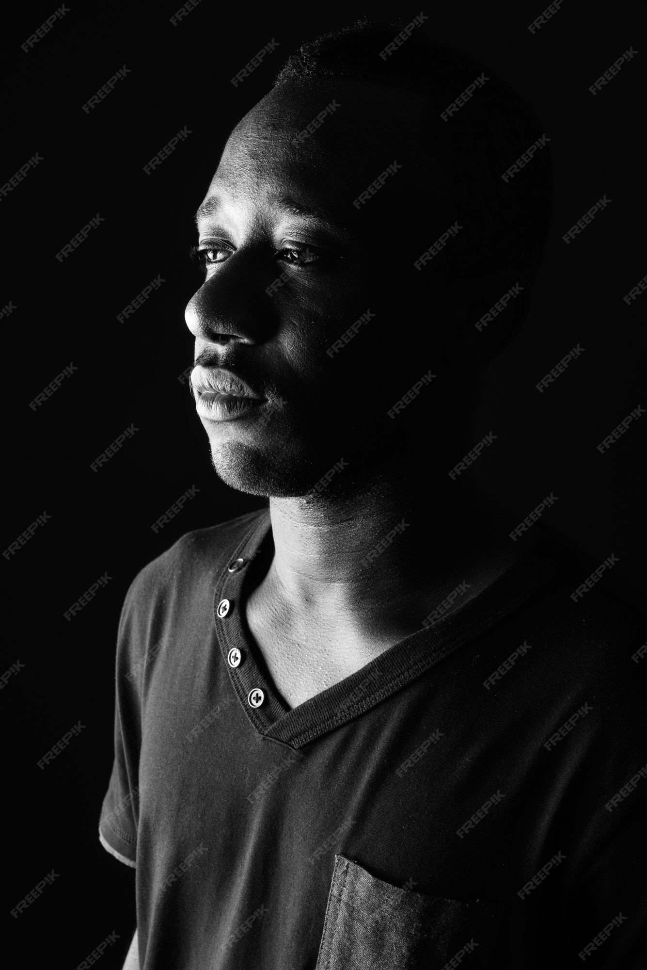 Premium Photo  Sad young african man profile view thinking in