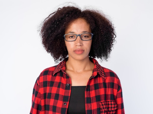 Face of young beautiful African hipster woman with eyeglasses