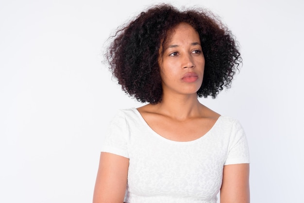 Face of young beautiful African woman thinking