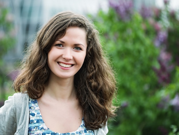 Face of the young beautiful woman outdoors