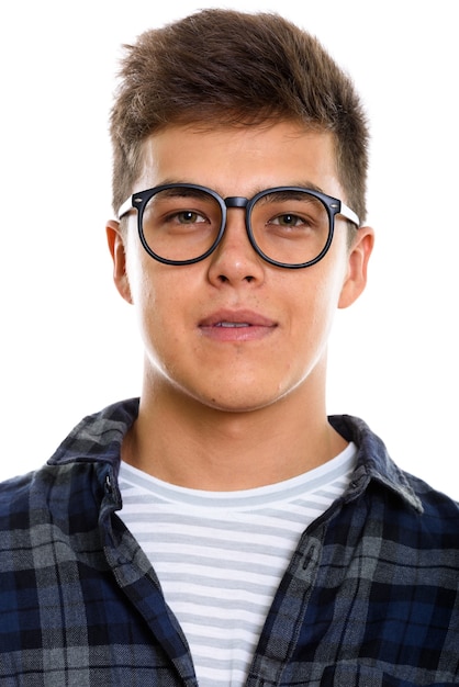 Face of young handsome man wearing eyeglasses