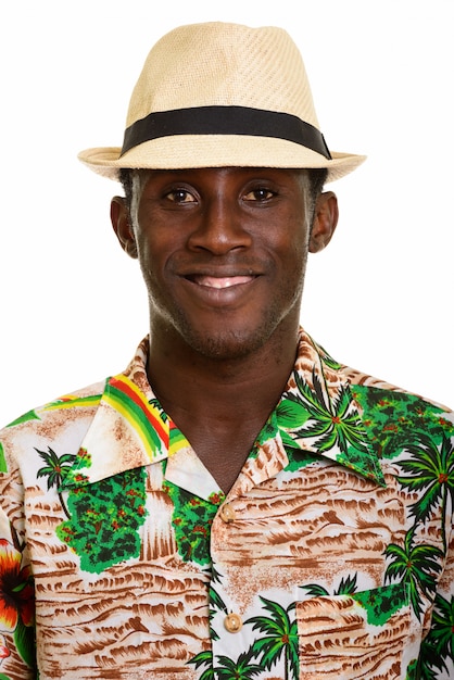 Face of young happy black African man smiling