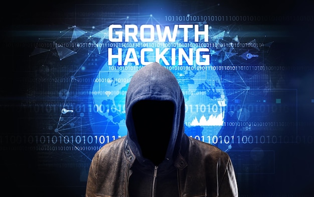 Faceless hacker at work security concept
