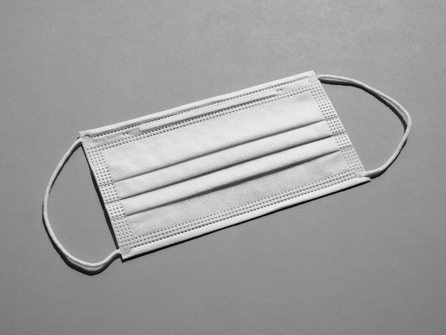 Facemask used for respiratory illness in black and white