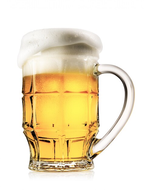 Faceted mug of light beer with foam