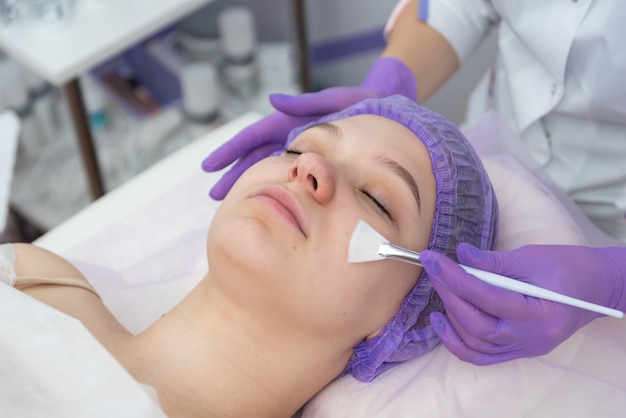 Facial brush peel retinol treatment beauty woman peeling procedure cosmetology young girl therapyhya...